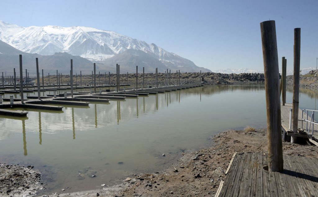 Al Hartmann/The Salt Lake Tribune Signs of the Great Salt Lake's low water level are evident at the Great Salt Lake Marina State Park in February 2016.  